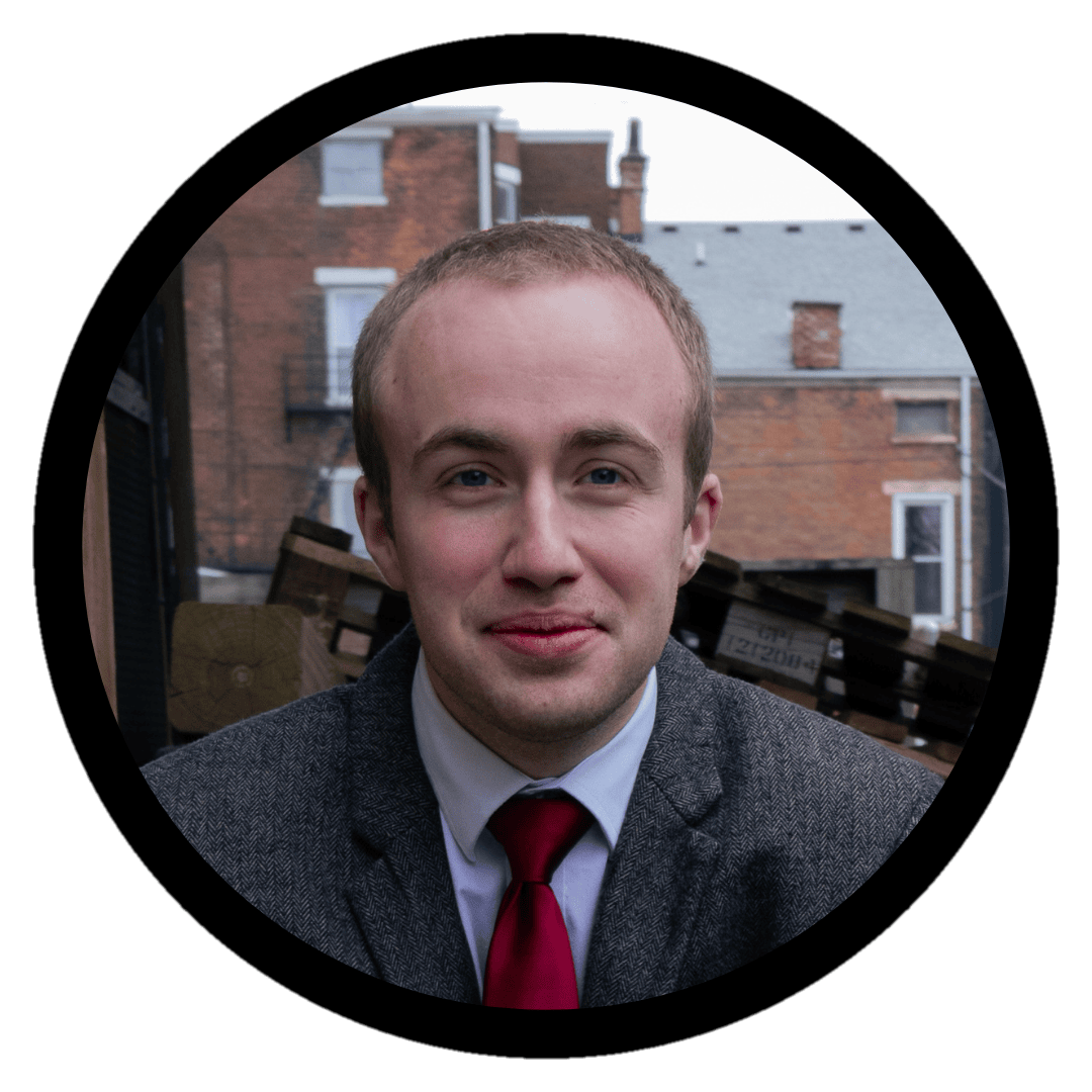 A headshot of Administrative Assistant Ethan Korte.